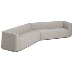 the corner sofa is made out of fabric and has a long, curved backrest