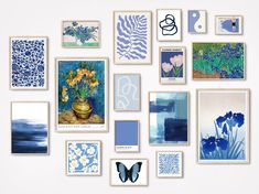 there are many pictures on the wall with blue and white flowers in them as well