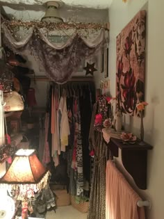 the closet is filled with clothes and other things to buy for someone's house