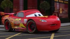 the character lightning from cars is driving down the street