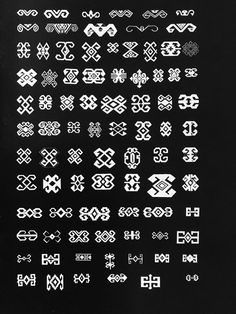 a black and white photo with many different designs on the back of it, including letters