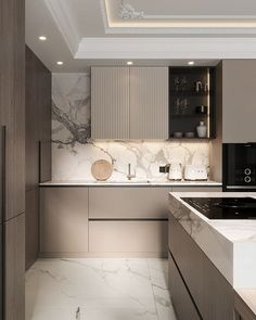 a modern kitchen with marble counter tops and white counterstop, built into the ceiling