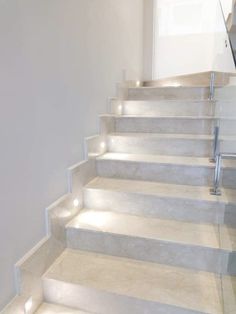 some white stairs with lights on them