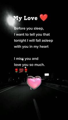 a dark road with a heart on it and the words, my love before you sleep i want to tell you that tonight will fall asleep with you in my heart