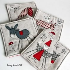 three handmade christmas cards with reindeers on them