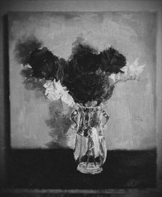 a black and white painting of flowers in a vase on a table with dark background