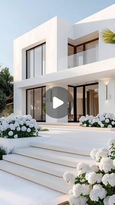 a house with white flowers in front of it