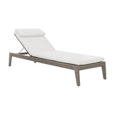 an outdoor chaise lounge chair with white cushions and wood frame, viewed from the side