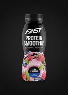 a bottle of protein smoothie with raspberries and blueberries