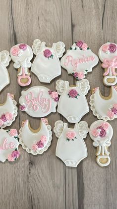 baby shower cookies decorated with pink and white icing