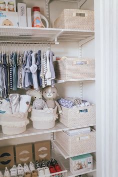 the closet is full of baby items and other things to put in it's bins