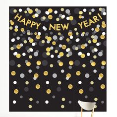 a black and gold new year's card with confetti