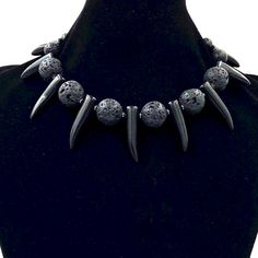 Adorn Yourself and Embody the Warrior Spirit of Shaka Zulu. This Warrior Inspired Necklace is suitable for Men or Women.Description:♦︎ Large 18MM Natural Black Lava Gemstones ♦︎ Black Turquoise Bone Spike Beads ♦︎ Black Hematite Gemstone Spacers ♦︎ Dark Antique Metal Lobster Closure Clasp and Chain ❖ Length/Size Options: 15 Inch to 21 Inch Sizing Guide♦︎ This Adornment is designed to sit on or near to your Collarbone.♦︎ To find Your size: Measure from the back of your neck around your collarbone Cheap Southwestern Style Black Beads Jewelry, Shaka Zulu, Mens Beaded Necklaces, African Inspired Clothing, Chunky Bead Necklaces, African Necklace, Warrior Spirit, Black Turquoise, Inspired Necklace