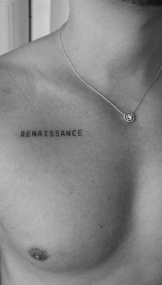 a shirtless man with the word renaissancee written on his chest