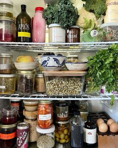 an open refrigerator filled with lots of food