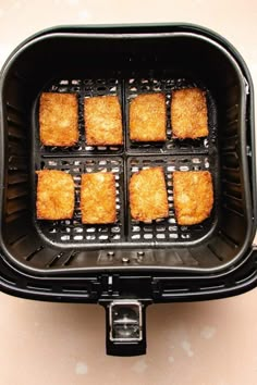 some food is being cooked in an air fryer