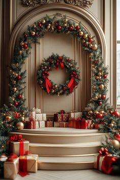 a christmas wreath and presents on a stage