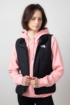 This The North Face Junction Insulated Vest for Women in Black is great for any adventure. Don't let the cold weather hold you back, conquer the outdoors with this top-of-the-line vest.Features:The North FaceStyle: NF0A88TJ-JK3Color: BlackBody: 100% Recycled PolyesterWomen’s vestZip front Sherpa lined neck Hand zippered pockets The North Face screen printed graphic on left chest in whiteRegular fitMeasurements from size large:Length from center back: 22” Chest: 35”Machine wash cold, tumble dry low Face Style, Animal Shoes, Women In Black, Vest For Women, Youth Shoes, Sneaker Slippers, Boutique Tops, Jumpsuit Shorts Rompers, Sherpa Lined