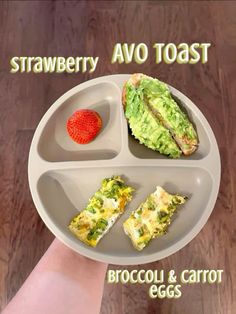 a person holding a plate with food on it and the words strawberry, avo toast