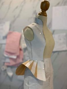 a mannequin made out of paper and fabric