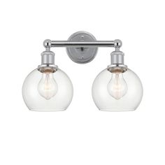 two light bathroom fixture in chrome finish with clear glass globes and metal fittings