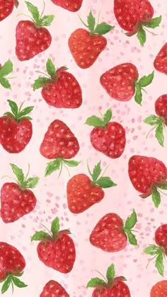 a pattern of strawberries on a pink background