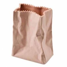 a brown paper bag is shown on a white background and it appears to be empty