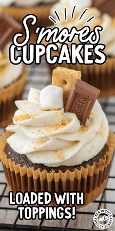 some cupcakes are sitting on a cooling rack