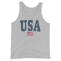 Gear up for summer holidays with our vintage style USA unisex tank -- great for men or women! Graphic is distressed for that instant vintage vibe. Youth sizes here: https://www.etsy.com/listing/1024874437/kids-usa-shirt-retro-usa-t-shirt-youth?ref=shop_home_active_2&pro=1&frs=1 Looking for more 4th of July gear? Check these out: https://www.etsy.com/shop/TheGraphicPeach?ref=seller-platform-mcnav§ion_id=33390667 Our shop uses direct-to-garment printing to make our products. The design ink Crew Neck Cotton Tank Top For 4th Of July, Casual American Flag Print Tank Top, Casual American Flag Print Sleeveless Tank Top, 4th Of July Cotton Tank Top With Letter Print, American Flag Print Cotton Tank Top For Independence Day, Casual 4th Of July Tank Top With Letter Print, 4th Of July American Flag Print Cotton Tank Top, Casual 4th Of July Graphic Print Tank Top, Casual 4th Of July Graphic Tank Top