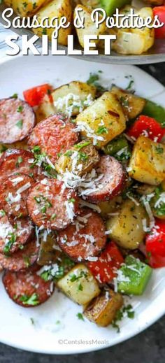 sausage and potatoes skillet on a white plate with parmesan cheese sprinkled on top