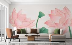 a living room with large pink flowers painted on the wall