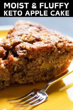 a close up of a piece of cake on a plate with a knife and fork