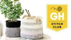 two baskets with plants in them sitting on a table next to a sign that says gh stitch club