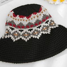 Knitted Bucket Hat Tribal Design Patterns Beautiful Seasonal Colors Warm & Cozy Black Acrylic Beanie, Casual Black Acrylic Beanie, Black Acrylic Yarn Beanie For Winter, Adjustable Knit Crochet Winter Hat, Adjustable Knit Crochet Hat For Winter, Winter Black Acrylic Yarn Beanie, Black Acrylic Hat, One Size Fits Most, Black Acrylic Hats For Fall, Black Acrylic Hat One Size Fits Most