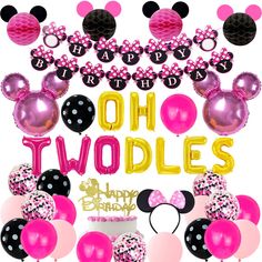 a birthday party with minnie mouse balloons and streamers