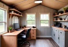 a home office with two desks and open shelving units on either side of the room