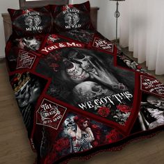 a bed covered in red and black comforter with skulls on it, roses and the words you & me we got this