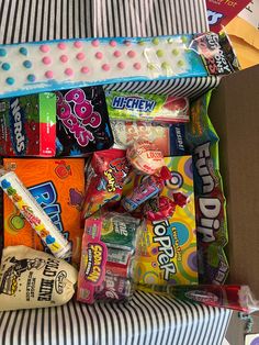 an open box filled with candy and candies