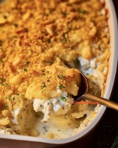 a casserole dish filled with chicken and cheese