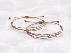 Say hello to our Riptide bracelet - all the drama of a stack in just one perfect bracelet. Like all your Tula Blue, Riptide bracelets are completely waterproof, perfect for those summer days that take you from the beach to the pool and back again. (Beach and pool not necessary for carefree summer vibes!) - Peacock freshwater pearl, Larimar rondelle stones & you pick your accent pearls: white or blush (4-5mm) - Signature Tula Blue hand-spun ROPE - 100% waterproof - Sliding knot closure for custom fit One more thing: Due to the one-of-a-kind nature of our materials, colors & shapes may vary slightly from the images shown. Sliding Knot Closure, Rose Gold Beads, Corpus Christi Tx, Versatile Jewelry, Summer Bracelets, Sliding Knot, Blue Hand, Miyuki Beads, String Bracelet