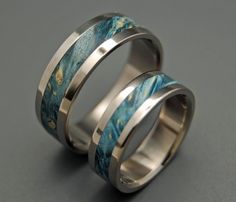 two wedding bands with blue marble inlays