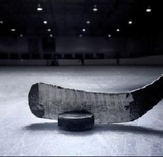 an ice hockey rink with a skateboard on it