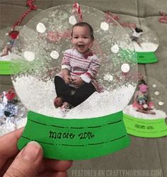 a snow globe with an image of a baby in it