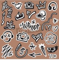 an assortment of graffiti stickers on a brown background