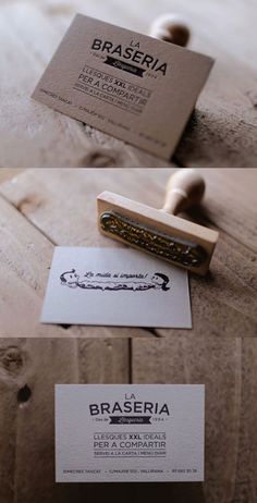 some business cards are sitting on top of a wooden table and one has a rubber stamp that says braseria