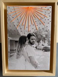 an image of a man and woman in front of a fireworks display with the caption's name on it