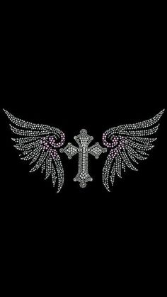 the cross with wings is shown on a black background and has pink crystals in it