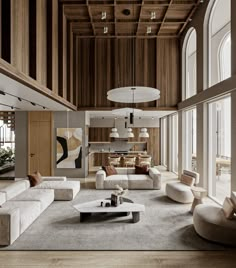 a large living room with high ceilings and wood paneling on the walls, along with modern furniture