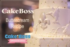 there is a cake with white frosting on it and the words cakeboss