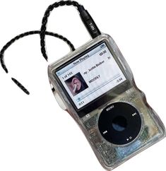 an mp3 player with a cord attached to it's back case and headphones